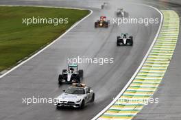Lewis Hamilton (GBR) Mercedes AMG F1 W07 Hybrid leads behind the FIA Safety Car. 13.11.2016. Formula 1 World Championship, Rd 20, Brazilian Grand Prix, Sao Paulo, Brazil, Race Day.