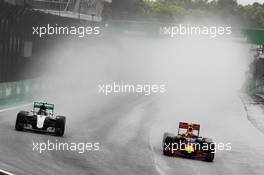 (L to R): Nico Rosberg (GER) Mercedes AMG F1 W07 Hybrid and Max Verstappen (NLD) Red Bull Racing RB12 battle for position. 13.11.2016. Formula 1 World Championship, Rd 20, Brazilian Grand Prix, Sao Paulo, Brazil, Race Day.
