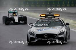 Lewis Hamilton (GBR) Mercedes AMG F1 W07 Hybrid leads behind the FIA Safety Car. 13.11.2016. Formula 1 World Championship, Rd 20, Brazilian Grand Prix, Sao Paulo, Brazil, Race Day.