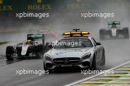 Lewis Hamilton (GBR) Mercedes AMG F1 W07 Hybrid leads behind the FIA Safety Car. 13.11.2016. Formula 1 World Championship, Rd 20, Brazilian Grand Prix, Sao Paulo, Brazil, Race Day.