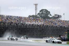 Lewis Hamilton (GBR) Mercedes AMG F1 W07 Hybrid leads behind the FIA Safety Car. 13.11.2016. Formula 1 World Championship, Rd 20, Brazilian Grand Prix, Sao Paulo, Brazil, Race Day.