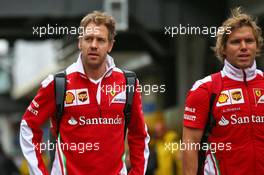 (L to R): Sebastian Vettel (GER) Ferrari with Antti Kontsas (FIN) Personal Trainer. 12.11.2016. Formula 1 World Championship, Rd 20, Brazilian Grand Prix, Sao Paulo, Brazil, Qualifying Day.