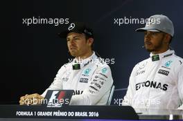 (L to R): Nico Rosberg (GER) Mercedes AMG F1 and team mate Lewis Hamilton (GBR) Mercedes AMG F1 in the FIA Press Conference. 12.11.2016. Formula 1 World Championship, Rd 20, Brazilian Grand Prix, Sao Paulo, Brazil, Qualifying Day.