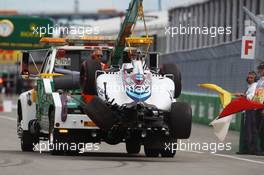 The Williams FW38 of Felipe Massa (BRA) Williams is recovered back to the pits on the back of a truck after he crashed in the first practice session. 10.06.2016. Formula 1 World Championship, Rd 7, Canadian Grand Prix, Montreal, Canada, Practice Day.