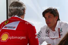 (L to R): Maurizio Arrivabene (ITA) Ferrari Team Principal with Toto Wolff (GER) Mercedes AMG F1 Shareholder and Executive Director. 10.06.2016. Formula 1 World Championship, Rd 7, Canadian Grand Prix, Montreal, Canada, Practice Day.