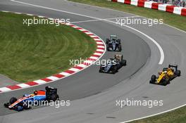 Rio Haryanto (IDN) Manor Racing MRT05 leads Sergio Perez (MEX) Sahara Force India F1 VJM09; Kevin Magnussen (DEN) Renault Sport F1 Team RS16 and Nico Rosberg (GER) Mercedes AMG F1 W07 Hybrid. 10.06.2016. Formula 1 World Championship, Rd 7, Canadian Grand Prix, Montreal, Canada, Practice Day.