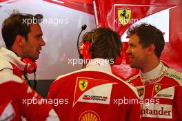 Jean-Eric Vergne (FRA) Ferrari Test and Development Driver (Left) and Sebastian Vettel (GER) Ferrari (Right). 10.06.2016. Formula 1 World Championship, Rd 7, Canadian Grand Prix, Montreal, Canada, Practice Day.