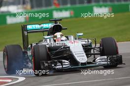 Lewis Hamilton (GBR) Mercedes AMG F1 W07 Hybrid locks up under braking. 10.06.2016. Formula 1 World Championship, Rd 7, Canadian Grand Prix, Montreal, Canada, Practice Day.