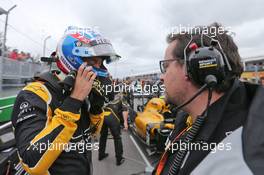 (L to R): Jolyon Palmer (GBR) Renault Sport F1 Team with Julien Simon-Chautemps (FRA) Renault Sport F1 Team Race Engineer on the grid. 12.06.2016. Formula 1 World Championship, Rd 7, Canadian Grand Prix, Montreal, Canada, Race Day.