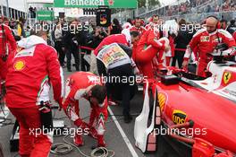 Sebastian Vettel (GER) Ferrari SF16-H on the grid. 12.06.2016. Formula 1 World Championship, Rd 7, Canadian Grand Prix, Montreal, Canada, Race Day.