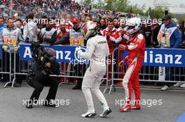 Race winner Lewis Hamilton (GBR) Mercedes AMG F1 celebrates in parc ferme with Sebastian Vettel (GER) Ferrari. 12.06.2016. Formula 1 World Championship, Rd 7, Canadian Grand Prix, Montreal, Canada, Race Day.