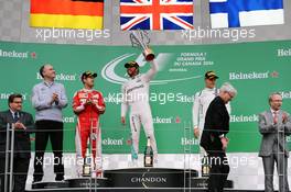 The podium (L to R): Sebastian Vettel (GER) Ferrari, second; Lewis Hamilton (GBR) Mercedes AMG F1, race winner; Valtteri Bottas (FIN) Williams, third. 12.06.2016. Formula 1 World Championship, Rd 7, Canadian Grand Prix, Montreal, Canada, Race Day.