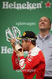 Sebastian Vettel (GER) Ferrari celebrates his second position on the podium. 12.06.2016. Formula 1 World Championship, Rd 7, Canadian Grand Prix, Montreal, Canada, Race Day.