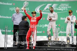 The podium (L to R): Sebastian Vettel (GER) Ferrari, second; Lewis Hamilton (GBR) Mercedes AMG F1, race winner; Valtteri Bottas (FIN) Williams, third. 12.06.2016. Formula 1 World Championship, Rd 7, Canadian Grand Prix, Montreal, Canada, Race Day.