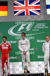 1st for Lewis Hamilton (GBR) Mercedes AMG F1 W07 , 2nd Sebastian Vettel (GER) Scuderia Ferrari SF16-H and 3rd for Valtteri Bottas (FIN) Williams Martini Racing FW38. 12.06.2016. Formula 1 World Championship, Rd 7, Canadian Grand Prix, Montreal, Canada, Race Day.