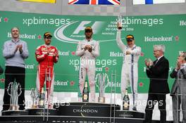 The podium (L to R): Sebastian Vettel (GER) Ferrari, second; Lewis Hamilton (GBR) Mercedes AMG F1, race winner; Valtteri Bottas (FIN) Williams, third. 12.06.2016. Formula 1 World Championship, Rd 7, Canadian Grand Prix, Montreal, Canada, Race Day.