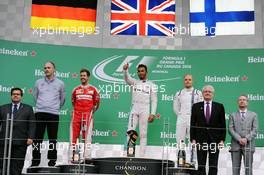 The podium (L to R): Sebastian Vettel (GER) Ferrari, second; Lewis Hamilton (GBR) Mercedes AMG F1, race winner; Valtteri Bottas (FIN) Williams, third. 12.06.2016. Formula 1 World Championship, Rd 7, Canadian Grand Prix, Montreal, Canada, Race Day.