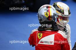 Sebastian Vettel (GER) Scuderia Ferrari SF16-H and Lewis Hamilton (GBR) Mercedes AMG F1 W07 . 12.06.2016. Formula 1 World Championship, Rd 7, Canadian Grand Prix, Montreal, Canada, Race Day.