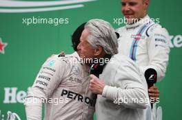 (L to R): Race winner Lewis Hamilton (GBR) Mercedes AMG F1 celebrates on the podium with Michael Douglas (USA) Actor. 12.06.2016. Formula 1 World Championship, Rd 7, Canadian Grand Prix, Montreal, Canada, Race Day.