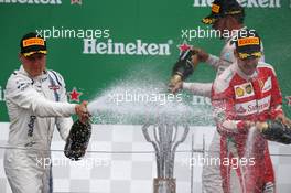 Valtteri Bottas (FIN) Williams Martini Racing FW38 and Sebastian Vettel (GER) Scuderia Ferrari SF16-H. 12.06.2016. Formula 1 World Championship, Rd 7, Canadian Grand Prix, Montreal, Canada, Race Day.