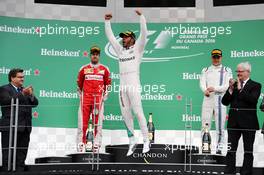 Race winner Lewis Hamilton (GBR) Mercedes AMG F1 W07 Hybrid celebrates on the podium. 12.06.2016. Formula 1 World Championship, Rd 7, Canadian Grand Prix, Montreal, Canada, Race Day.