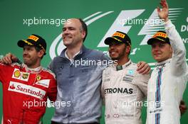 The podium (L to R): Sebastian Vettel (GER) Ferrari, second; Lewis Hamilton (GBR) Mercedes AMG F1, race winner; Valtteri Bottas (FIN) Williams, third. 12.06.2016. Formula 1 World Championship, Rd 7, Canadian Grand Prix, Montreal, Canada, Race Day.