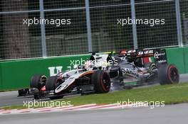 Sergio Perez (MEX) Sahara Force India F1 VJM09 and Romain Grosjean (FRA) Haas F1 Team VF-16 battle for position. 12.06.2016. Formula 1 World Championship, Rd 7, Canadian Grand Prix, Montreal, Canada, Race Day.