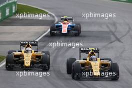 Jolyon Palmer (GBR) Renault Sport F1 Team RS16 and team mate Kevin Magnussen (DEN) Renault Sport F1 Team RS16. 12.06.2016. Formula 1 World Championship, Rd 7, Canadian Grand Prix, Montreal, Canada, Race Day.