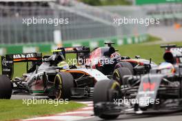 Sergio Perez (MEX) Sahara Force India F1 VJM09 and Daniil Kvyat (RUS) Scuderia Toro Rosso STR11 battle for position. 12.06.2016. Formula 1 World Championship, Rd 7, Canadian Grand Prix, Montreal, Canada, Race Day.