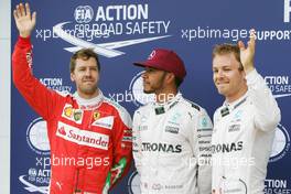 Qualifying top three in parc ferme (L to R): Sebastian Vettel (GER) Ferrari, third; Lewis Hamilton (GBR) Mercedes AMG F1, pole position; Nico Rosberg (GER) Mercedes AMG F1, second. 11.06.2016. Formula 1 World Championship, Rd 7, Canadian Grand Prix, Montreal, Canada, Qualifying Day.