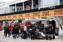 Nico Rosberg (GER) Mercedes AMG F1 W07 Hybrid and team mate Lewis Hamilton (GBR) Mercedes AMG F1 W07 Hybrid in the pits. 11.06.2016. Formula 1 World Championship, Rd 7, Canadian Grand Prix, Montreal, Canada, Qualifying Day.