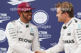 (L to R): Lewis Hamilton (GBR) Mercedes AMG F1 celebrates his pole position with team mate Nico Rosberg (GER) Mercedes AMG F1. 11.06.2016. Formula 1 World Championship, Rd 7, Canadian Grand Prix, Montreal, Canada, Qualifying Day.