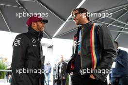 (L to R): Lewis Hamilton (GBR) Mercedes AMG F1 with Tom Brady (USA) New England Patriots Quarterback. 12.06.2016. Formula 1 World Championship, Rd 7, Canadian Grand Prix, Montreal, Canada, Race Day.