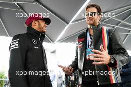 (L to R): Lewis Hamilton (GBR) Mercedes AMG F1 with Tom Brady (USA) New England Patriots Quarterback. 12.06.2016. Formula 1 World Championship, Rd 7, Canadian Grand Prix, Montreal, Canada, Race Day.