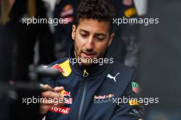 Daniel Ricciardo (AUS) Red Bull Racing signs autographs for the fans. 09.06.2016. Formula 1 World Championship, Rd 7, Canadian Grand Prix, Montreal, Canada, Preparation Day.