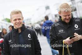 (L to R): Kevin Magnussen (DEN) Renault Sport F1 Team with Andy Stobart (GBR) Renault Sport F1 Team Press Officer. 09.06.2016. Formula 1 World Championship, Rd 7, Canadian Grand Prix, Montreal, Canada, Preparation Day.
