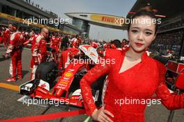 Grid girl for Kimi Raikkonen (FIN) Ferrari SF16-H. 17.04.2016. Formula 1 World Championship, Rd 3, Chinese Grand Prix, Shanghai, China, Race Day.