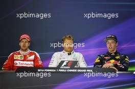 The post race FIA Press Conference (L to R): Sebastian Vettel (GER) Ferrari; Nico Rosberg (GER) Mercedes AMG F1; Daniil Kvyat (RUS) Red Bull Racing. 17.04.2016. Formula 1 World Championship, Rd 3, Chinese Grand Prix, Shanghai, China, Race Day.