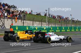 Valtteri Bottas (FIN) Williams FW38, Jolyon Palmer (GBR) Renault Sport F1 Team RS16 and Sergio Perez (MEX) Sahara Force India F1 VJM09 battle for position. 17.04.2016. Formula 1 World Championship, Rd 3, Chinese Grand Prix, Shanghai, China, Race Day.