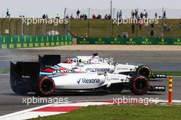 Valtteri Bottas (FIN) Williams FW38 and team mate Felipe Massa (BRA) Williams FW38 battle for position. 17.04.2016. Formula 1 World Championship, Rd 3, Chinese Grand Prix, Shanghai, China, Race Day.