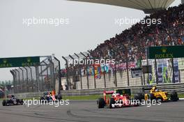 Kimi Raikkonen (FIN) Ferrari SF16-H and Jolyon Palmer (GBR) Renault Sport F1 Team RS16 battle for position. 17.04.2016. Formula 1 World Championship, Rd 3, Chinese Grand Prix, Shanghai, China, Race Day.