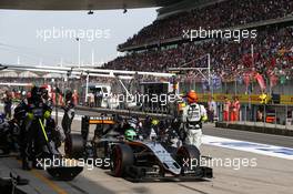Nico Hulkenberg (GER)Sahara Force India F1 Team VJM09  Pit stop. 17.04.2016. Formula 1 World Championship, Rd 3, Chinese Grand Prix, Shanghai, China, Race Day.
