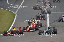 (L to R): Daniel Ricciardo (AUS) Red Bull Racing RB12 and Nico Rosberg (GER) Mercedes AMG F1 W07 Hybrid lead at the start of the race. 17.04.2016. Formula 1 World Championship, Rd 3, Chinese Grand Prix, Shanghai, China, Race Day.
