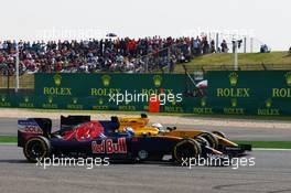 Max Verstappen (NLD) Scuderia Toro Rosso STR11 and Kevin Magnussen (DEN) Renault Sport F1 Team RS16 battle for position. 17.04.2016. Formula 1 World Championship, Rd 3, Chinese Grand Prix, Shanghai, China, Race Day.