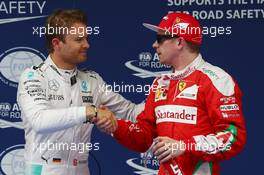 Nico Rosberg (GER) Mercedes AMG Petronas F1 W07 and Kimi Raikkonen (FIN) Scuderia Ferrari SF16-H. 16.04.2016. Formula 1 World Championship, Rd 3, Chinese Grand Prix, Shanghai, China, Qualifying Day.