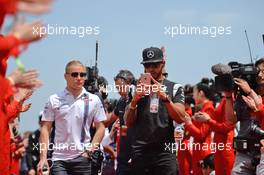 Lewis Hamilton (GBR) Mercedes AMG F1 and Valtteri Bottas (FIN) Williams FW38 on the drivers parade. 17.04.2016. Formula 1 World Championship, Rd 3, Chinese Grand Prix, Shanghai, China, Race Day.