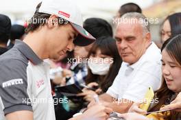 Esteban Gutierrez (MEX) Haas F1 Team signs autographs for the fans. 14.04.2016. Formula 1 World Championship, Rd 3, Chinese Grand Prix, Shanghai, China, Preparation Day.