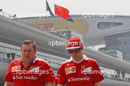 Kimi Raikkonen (FIN) Ferrari with Dave Greenwood (GBR) Ferrari Race Engineer. 14.04.2016. Formula 1 World Championship, Rd 3, Chinese Grand Prix, Shanghai, China, Preparation Day.