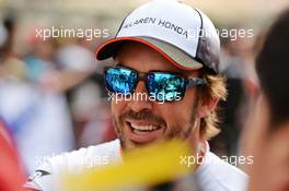 Fernando Alonso (ESP) McLaren signs autographs for the fans. 14.04.2016. Formula 1 World Championship, Rd 3, Chinese Grand Prix, Shanghai, China, Preparation Day.