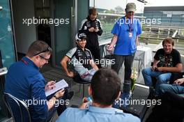 Sergio Perez (MEX) Sahara Force India F1 with the media. 14.04.2016. Formula 1 World Championship, Rd 3, Chinese Grand Prix, Shanghai, China, Preparation Day.